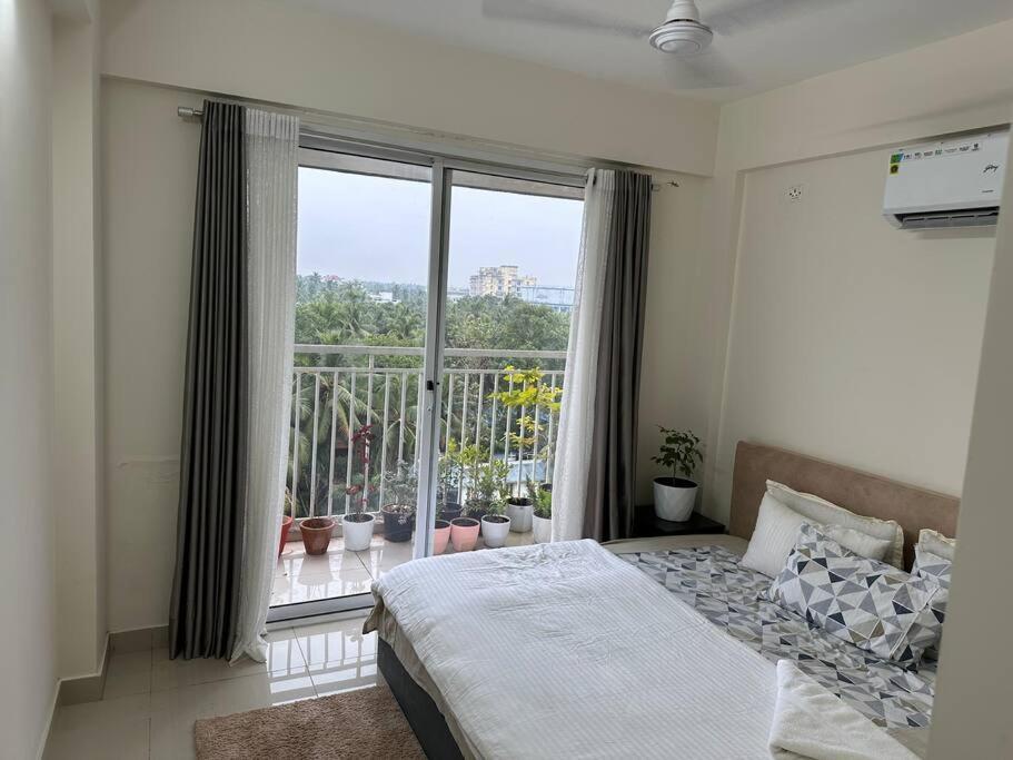 Memmsta Blooming Bird Guruvayur Vila Exterior foto